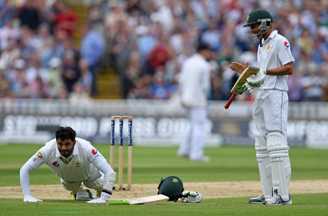 azhar ali celebrates by doing press ups after reaching his century photo afp