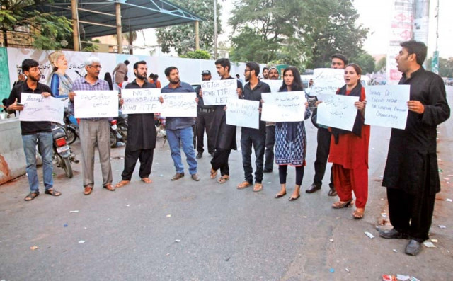 a group from the civil progressive alliance stages a protest against the attack on a quetta police training centre outside the karachi press club on wednesday photo athar khan express a group from the civil progressive alliance stages a protest against the attack on a quetta police training centre outside the karachi press club on wednesday photo athar khan express