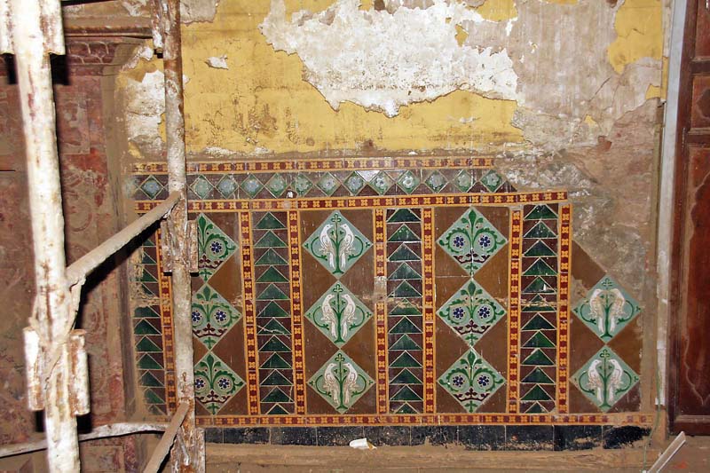 all four walls of the room are bordered with the tiles at the bottom which were used apparently fixed when the lhc building was constructed in 1867 photo express