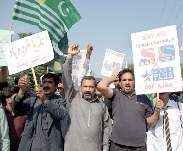 kashmiri people including cable tv operators shout anti india slogans at a protest in muzaffarabad on wednesday held to support a ban on indian tv channels photo afp kashmiri people including cable tv operators shout anti india slogans at a protest in muzaffarabad on wednesday held to support a ban on indian tv channels photo afp