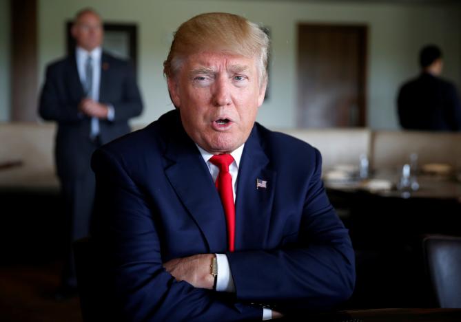 republican u s presidential nominee donald trump sits for an interview at trump national doral golf club in miami florida us photo reuters