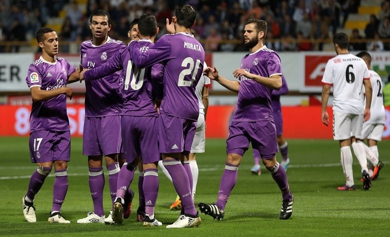 real madrid players celebrate their opening goal during the spanish copa del rey king 039 s cup round of 32 first leg football match between cultural y deportiva leonesa and real madrid at the reino de leon stadium in leon on october 26 2016 photo afp