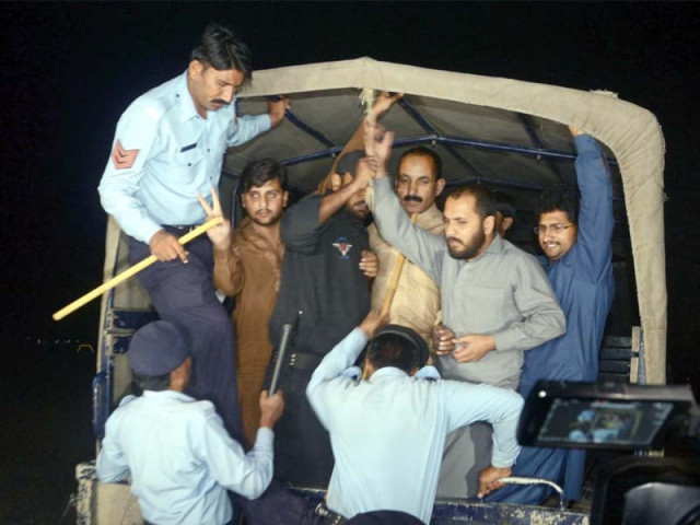 pti workers rounded up by the capital police after section 144 was imposed in islamabad photo mudassar raja express pti workers rounded up by the capital police after section 144 was imposed in islamabad photo mudassar raja express