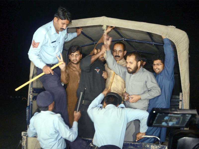 pti workers rounded up by the capital police after section 144 was imposed in islamabad photo mudassar raja express