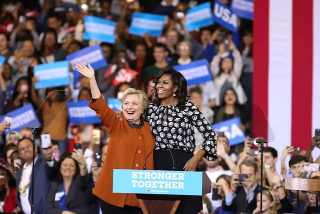 us democratic presidential candidate hillary clinton and us first lady michelle obama embrace before they address the crowd at a campaign stop in winston salem north carolina on october 27 2016 photo afp us democratic presidential candidate hillary clinton and us first lady michelle obama embrace before they address the crowd at a campaign stop in winston salem north carolina on october 27 2016 photo afp