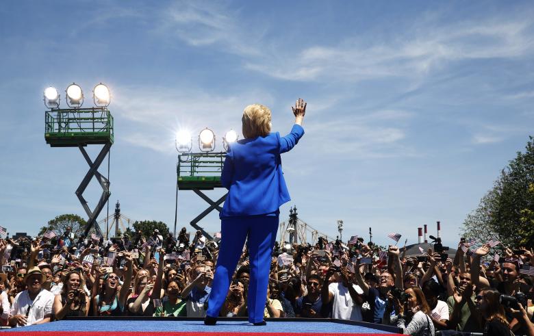 hillary clinton waves to the crowd after delivering her quot official launch speech quot at a campaign kick off rally in franklin d roosevelt four freedoms park photo reuters