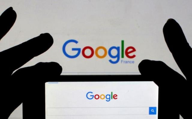 a woman holds her smart phone which displays the google home page in this picture illustration taken february 24 2016 photo reuters a woman holds her smart phone which displays the google home page in this picture illustration taken february 24 2016 photo reuters