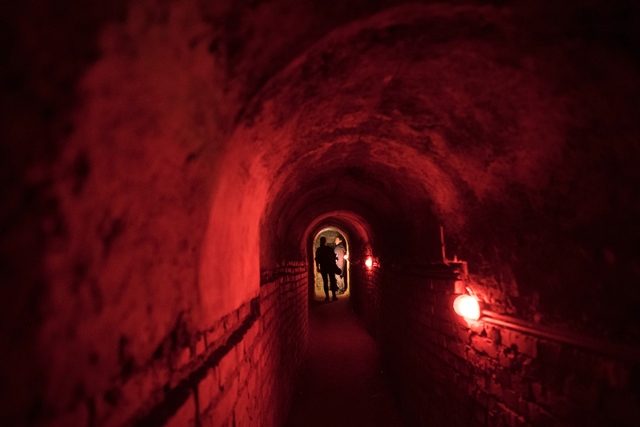 people stand in a 13th century cellar in vienna austria on october 19 2016 the cellar is one of many deep below the historic centre the austrian city of sissi and schubert has a distinctly dark side and not just at halloween the austrian city of sissi and schubert has a distinctly dark side and not just at halloween photo afp