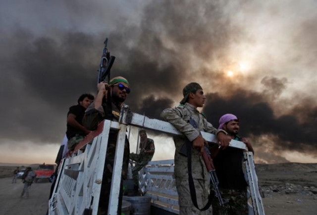iraqi pro government forces are seen in qayyara photo reuters iraqi pro government forces are seen in qayyara photo reuters