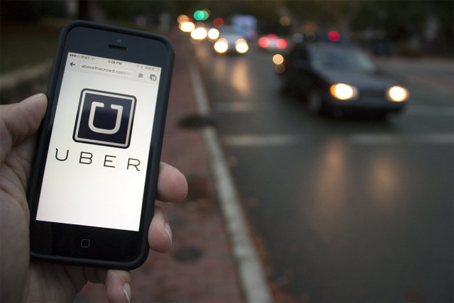 the logo of car sharing service app uber photo afp the logo of car sharing service app uber photo afp