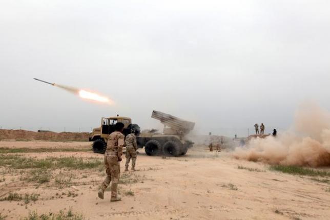 file photo of iraqi soldiers firing a rocket toward islamic state militants on the outskirt of the makhmour south of mosul iraq photo reuters