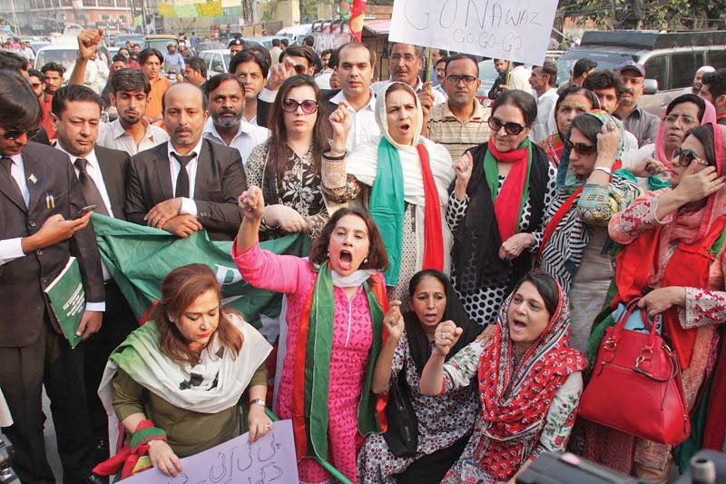 pti leaders shout slogans during a protest outside the press club photo abid nawaz express