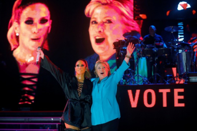 us democratic presidential nominee hillary clinton joins performer jennifer lopez at a campaign concert in miami florida us october 29 2016 photo reuters us democratic presidential nominee hillary clinton joins performer jennifer lopez at a campaign concert in miami florida us october 29 2016 photo reuters