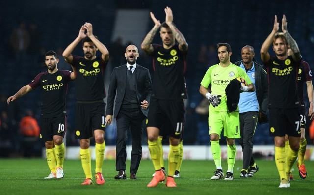 pep guardiola c celebrates on the pitch with his players in west bromwich england on october 29 2016 photo afp pep guardiola c celebrates on the pitch with his players in west bromwich england on october 29 2016 photo afp
