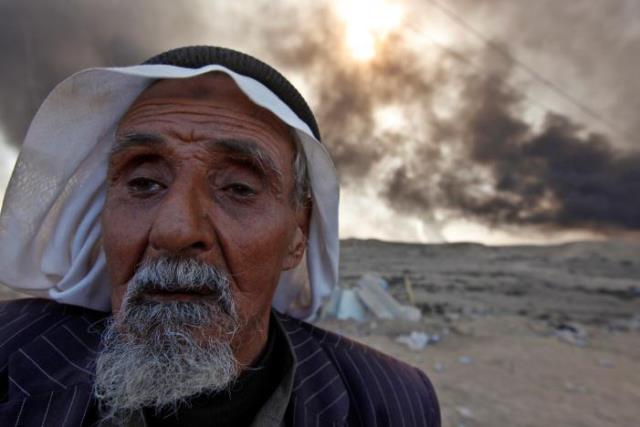 a man returns to his village after it was liberated from islamic state militants south of mosul in qayyara iraq october 22 2016 photo reuters