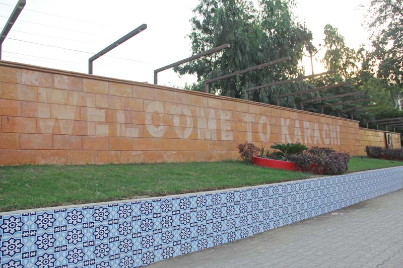 the stainless steel letters welcome to karachi affixed to a pink wall at star gate chowrangi which were installed in june have slowly disappeared photo ayesha mir express