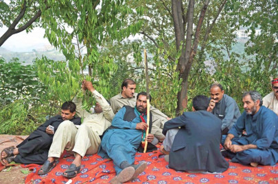 camp bani gala workers set up camp outside imran s residence
