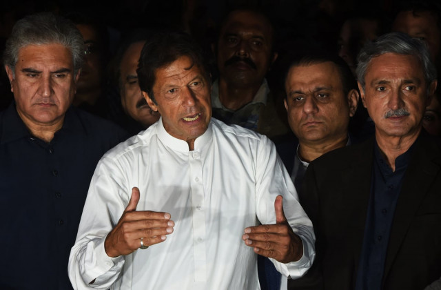 pakistani opposition leader of the tehreek i insaf pti political party imran khan c speaks during a press briefing outside his house in islamabad on october 30 2016 photo afp pakistani opposition leader of the tehreek i insaf pti political party imran khan c speaks during a press briefing outside his house in islamabad on october 30 2016 photo afp
