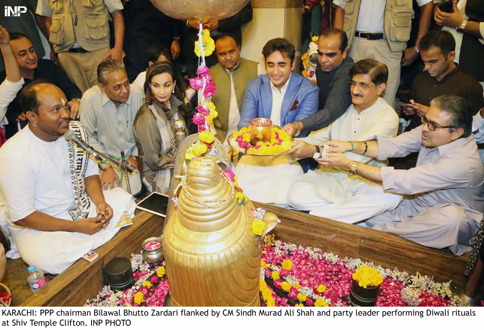 ppp chairman bilawal bhutto zardari flanked by cm murad ali shah and party leader performing dewali rituals at shiv temple clifton photo inp ppp chairman bilawal bhutto zardari flanked by cm murad ali shah and party leader performing dewali rituals at shiv temple clifton photo inp