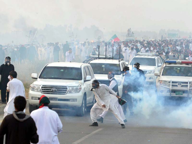 pti activists clash with police in swabi during their march to the federal capital photo afp