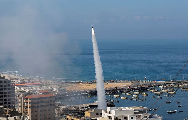 Rockets are fired by Palestinian militants into Israel, in Gaza City October 7. REUTERS