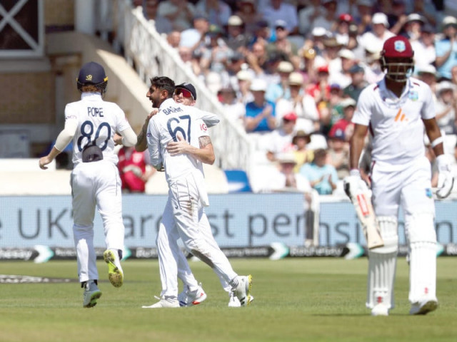 england s shoaib bashir 2l celebrates after taking the wicket of west indian mikyle louis on the second day of the second test at trent bridge on friday photo afp england s shoaib bashir 2l celebrates after taking the wicket of west indian mikyle louis on the second day of the second test at trent bridge on friday photo afp