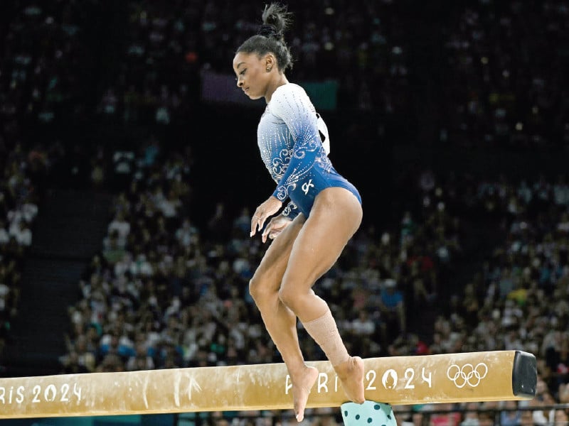 simone biles says goodbye to the paris olympics with a silver medal in women s gymnastics floor exercise photo afp