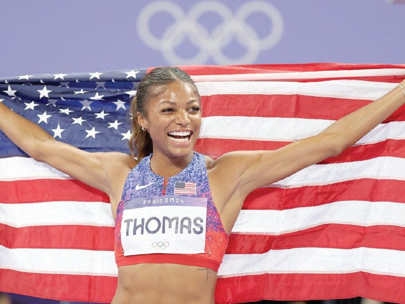 sprinter gabby thomas of the u s celebrates winning the gold medal after competing in the women s 200m final at stade de france photo afp