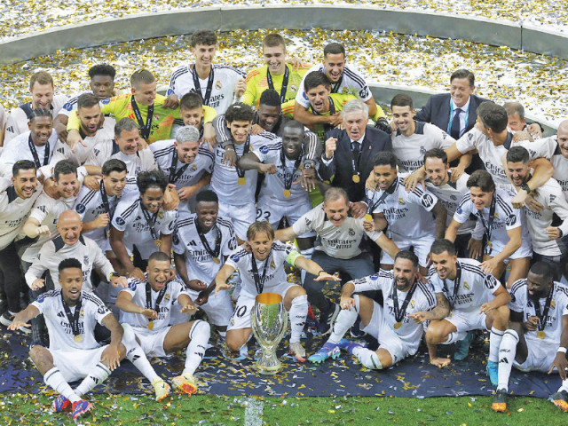 real madrid players are celebrating their victory over atlanta in the uefa super cup final photo afp real madrid players are celebrating their victory over atlanta in the uefa super cup final photo afp