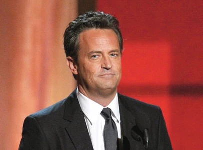 five charged over perry s death