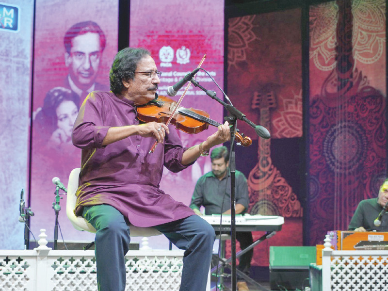 renowned instrumentalist ustad raees ahmed khan delivers a captivating musical tribute to legendary composer master ghulam haider during a special event at the pakistan national council of the arts in islamabad photo express