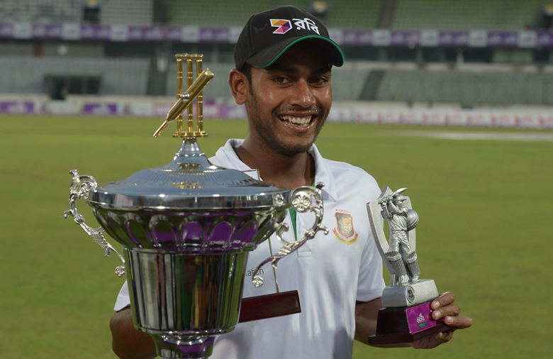 bangladesh 039 s mehedi hasan poses for a photograph with the 039 man of the series 039 during the prize giving ceremony after the third day of the second test cricket match bangladesh and england at the sher e bangla national cricket stadium in dhaka on october 30 2016 photo afp