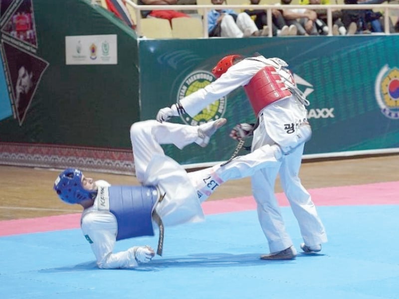 a view of the under 58kg taekwondo contest being held on monday in the 17th korean ambassador championship in islamabad photo app