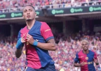 barcelona s brazilian forward raphinha celebrates scoring their fourth goal against real madrid photo afp