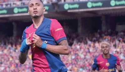 barcelona s brazilian forward raphinha celebrates scoring their fourth goal against real madrid photo afp