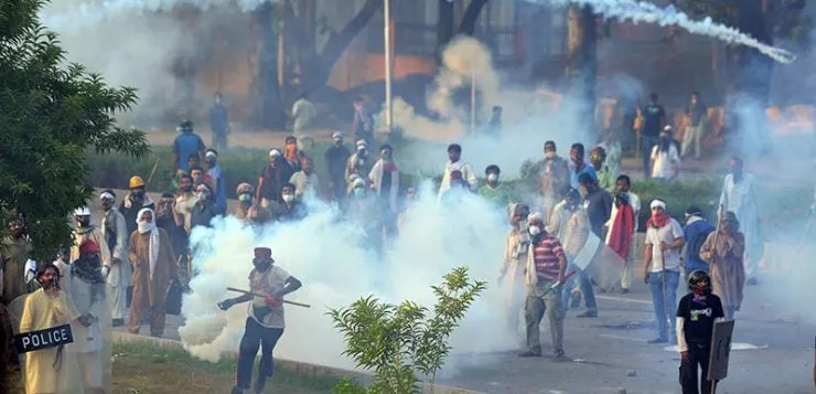 an express news screen grab of clash between police and pti workers an express news screen grab of clash between police and pti workers