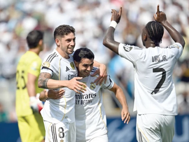 real madrid players celebrate their 3 2 win over pachuca in the club world cup photo afp real madrid players celebrate their 3 2 win over pachuca in the club world cup photo afp