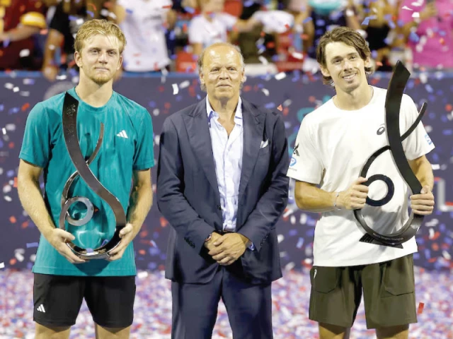 alejandro davidovich fokina spain and alex de minaur australia hold the finalist and championship trophies photo reuters alejandro davidovich fokina spain and alex de minaur australia hold the finalist and championship trophies photo reuters