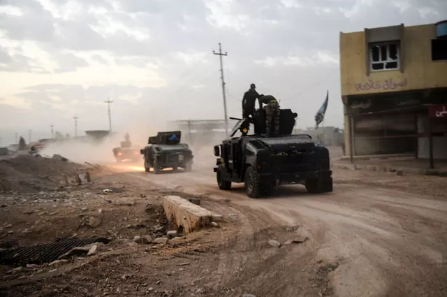 members of the iraqi counter terrorism service cts drive near the village of bazwaya on the eastern edges of mosul tightening the noose on mosul as the offensive to retake the islamic state group stronghold entered its third week on october 31 2016 photo afp members of the iraqi counter terrorism service cts drive near the village of bazwaya on the eastern edges of mosul tightening the noose on mosul as the offensive to retake the islamic state group stronghold entered its third week on october 31 2016 photo afp