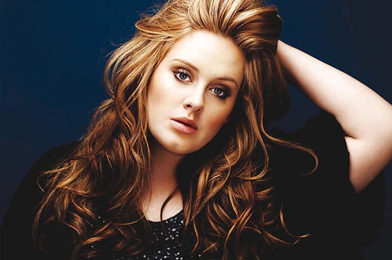 adele says she hasn t felt depressed since giving birth photo file