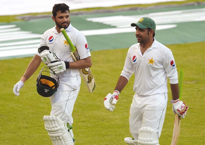 with pakistan losing four crucial wickets and ending the third day on 87 4 the responsibility has fallen on azhar and sarfraz s shoulders to set a strong total photo afp