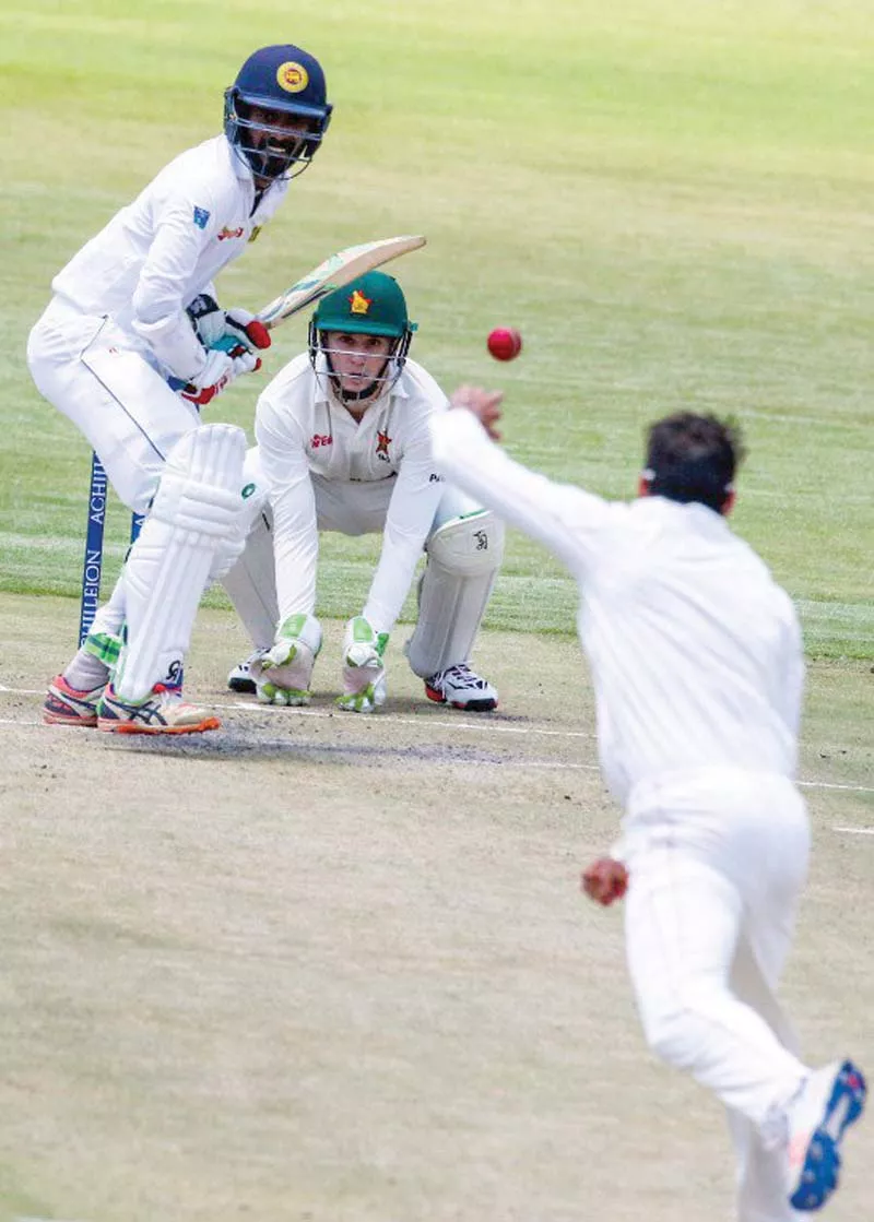 karunaratne survived an early drop to score 110 before being caught and bowled by chris mpofu just before tea photo courtesy slc karunaratne survived an early drop to score 110 before being caught and bowled by chris mpofu just before tea photo courtesy slc