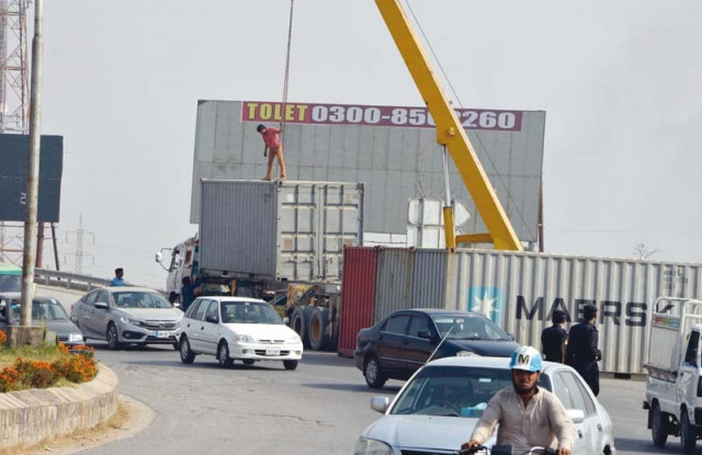 due to the impounding of large number of containers the business community has been facing huge losses as most containers are stuffed with import or export goods as well as perishable items that have failed to reach destinations photo express due to the impounding of large number of containers the business community has been facing huge losses as most containers are stuffed with import or export goods as well as perishable items that have failed to reach destinations photo express