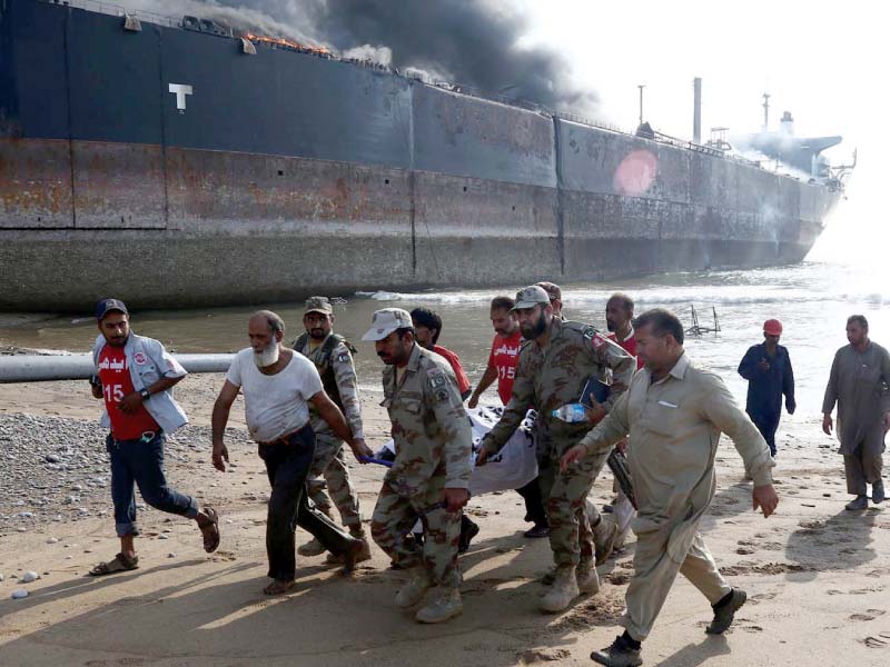 emergency services gather around the wreckage of a burning ship after a gas cylinder explosion at the gadani shipbreaking yard photo inp