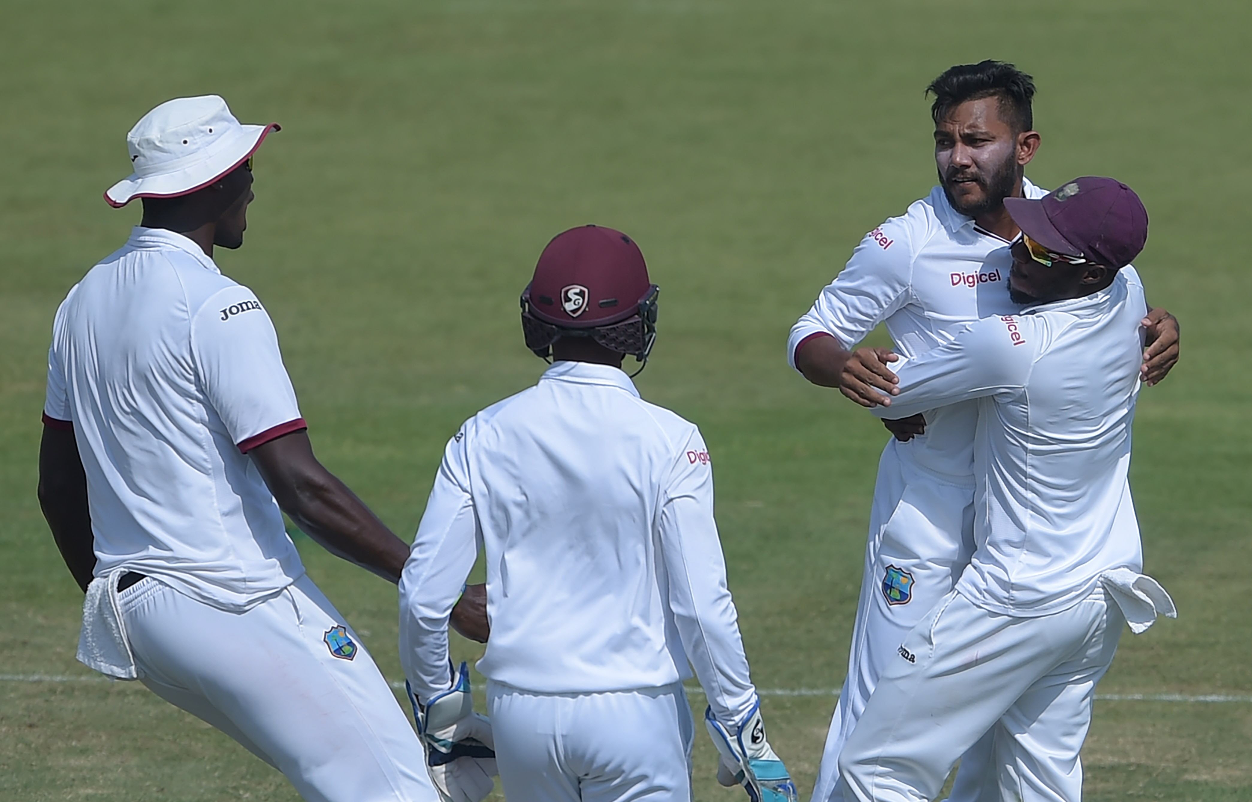 west indies 039 spinner devendra bishoo 2nd r celebrates with teammates after taking the wicket of pakistani batsman sarfraz ahmed unseen on the fourth day of the third and final test between pakistan and the west indies at the sharjah cricket stadium in sharjah on november 2 2016 photo afp