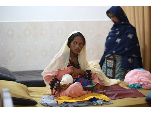 a mother feeds her child at a mobile feeding centre run by m decins sans fronti res msf in dera murad jamali pakistan photo afp a mother feeds her child at a mobile feeding centre run by m decins sans fronti res msf in dera murad jamali pakistan photo afp