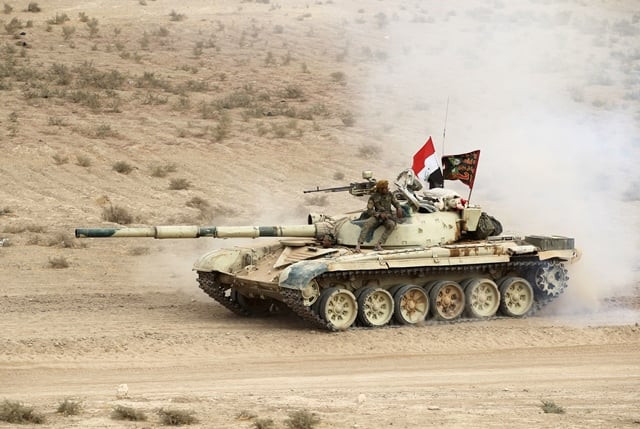 an iraqi forces tank advances towards the village of abu shuwayhah south of mosul on november 1 2016 during the ongoing operation to retake the last major islamic state is group stronghold in iraq photo afp an iraqi forces tank advances towards the village of abu shuwayhah south of mosul on november 1 2016 during the ongoing operation to retake the last major islamic state is group stronghold in iraq photo afp
