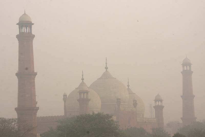 smog hangs in the air around badshahi mosque in lahore photo abid nawaz express