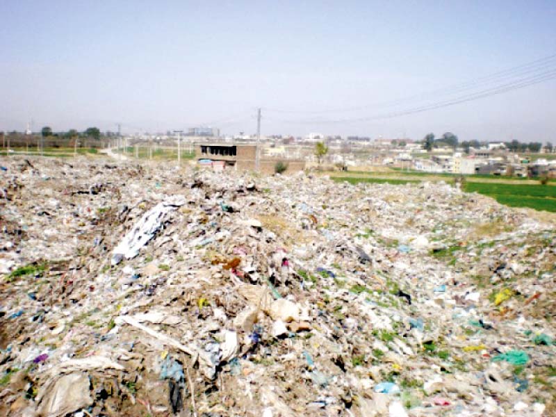 heaps of garbage at bhatta chowk photo express