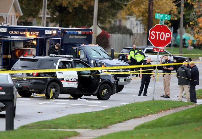 officials investigate the scene of a police shooting in urbandale iowa where one of two police officers were shot and killed in separate attacks described as quot ambush style quot in urbandale and des moines iowa us november 2 2016 photo reuters